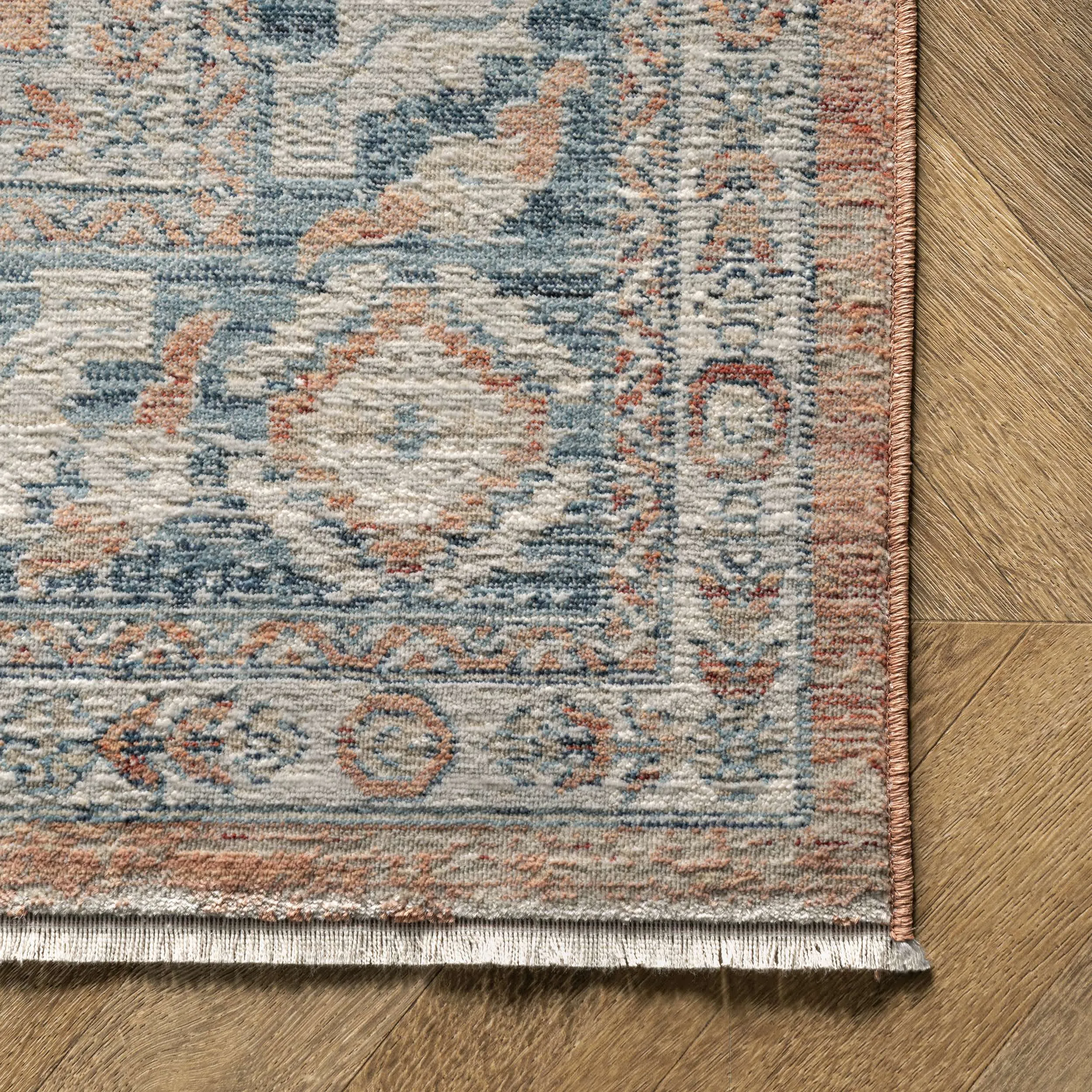 Westlyn Faded Medallion Area Rug