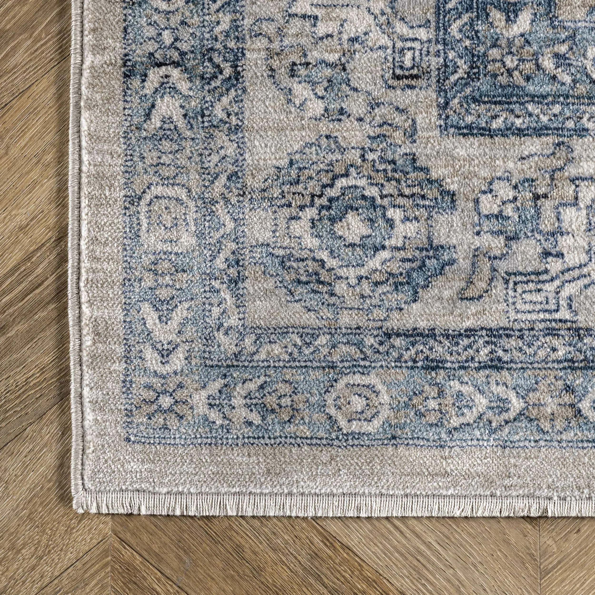 Westlyn Faded Medallion Area Rug